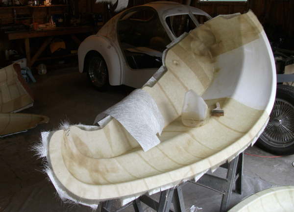 Front fender inboard mat layup