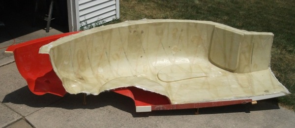 Body half coming out of mold