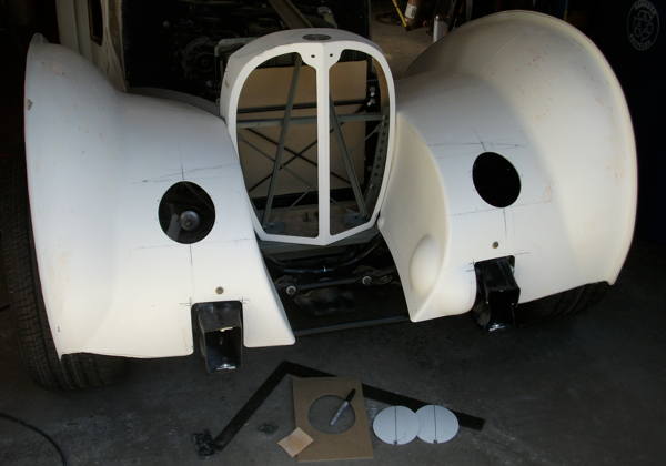 Front fender headlight holes cut out